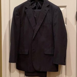 Joseph A Banks men’s blue stopped suit.